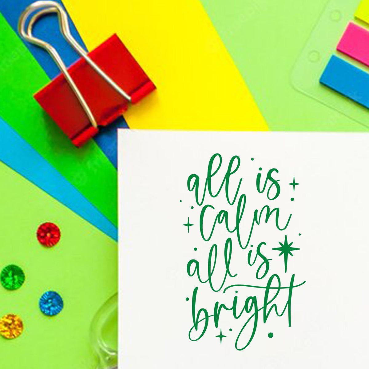 All Calm All Bright rubber stamp shown in green ink, stamped for projects such as silent night album.
