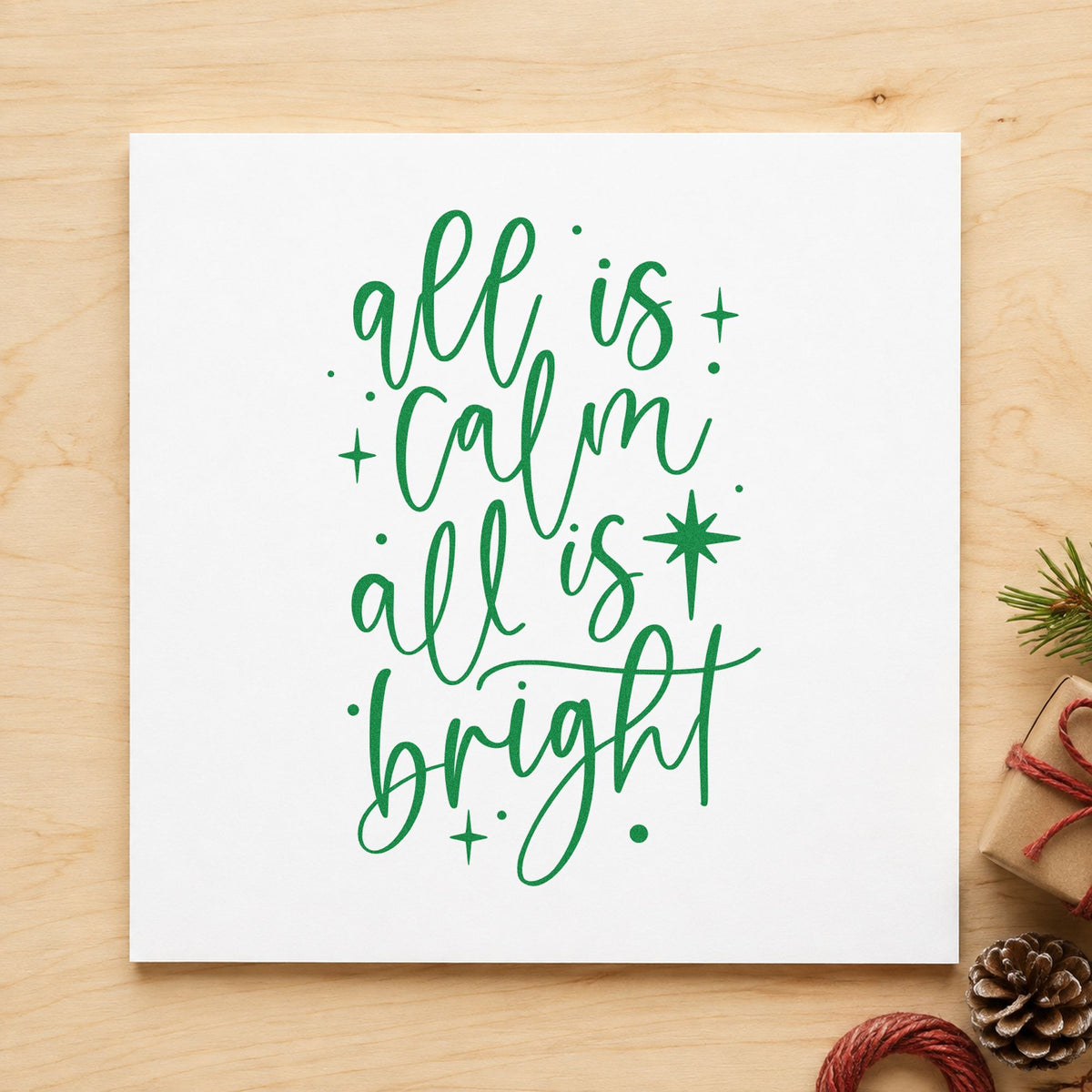All Calm All Bright craft stamp imprinted in green ink on paper, a design suited to framed bath shelf.