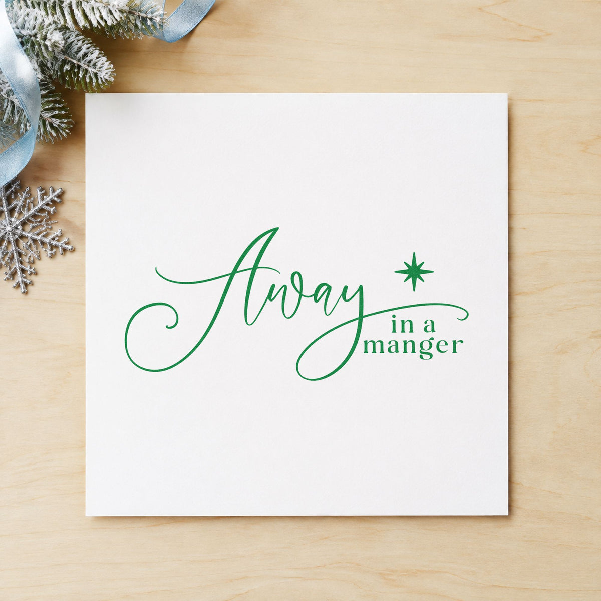 Away In A Manger craft stamp imprint in green ink on a handmade project, one idea being carol sing programs.