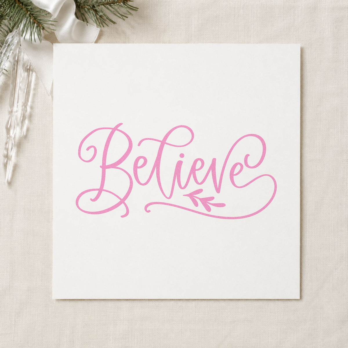 Believe With Leaf Flourish craft stamp in purple ink on cardstock, an easy option for keepsake album plate.