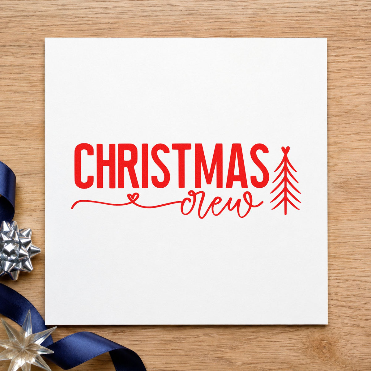 Christmas Crew With Tree rubber stamp shown in red ink, stamped for projects such as care box seals.