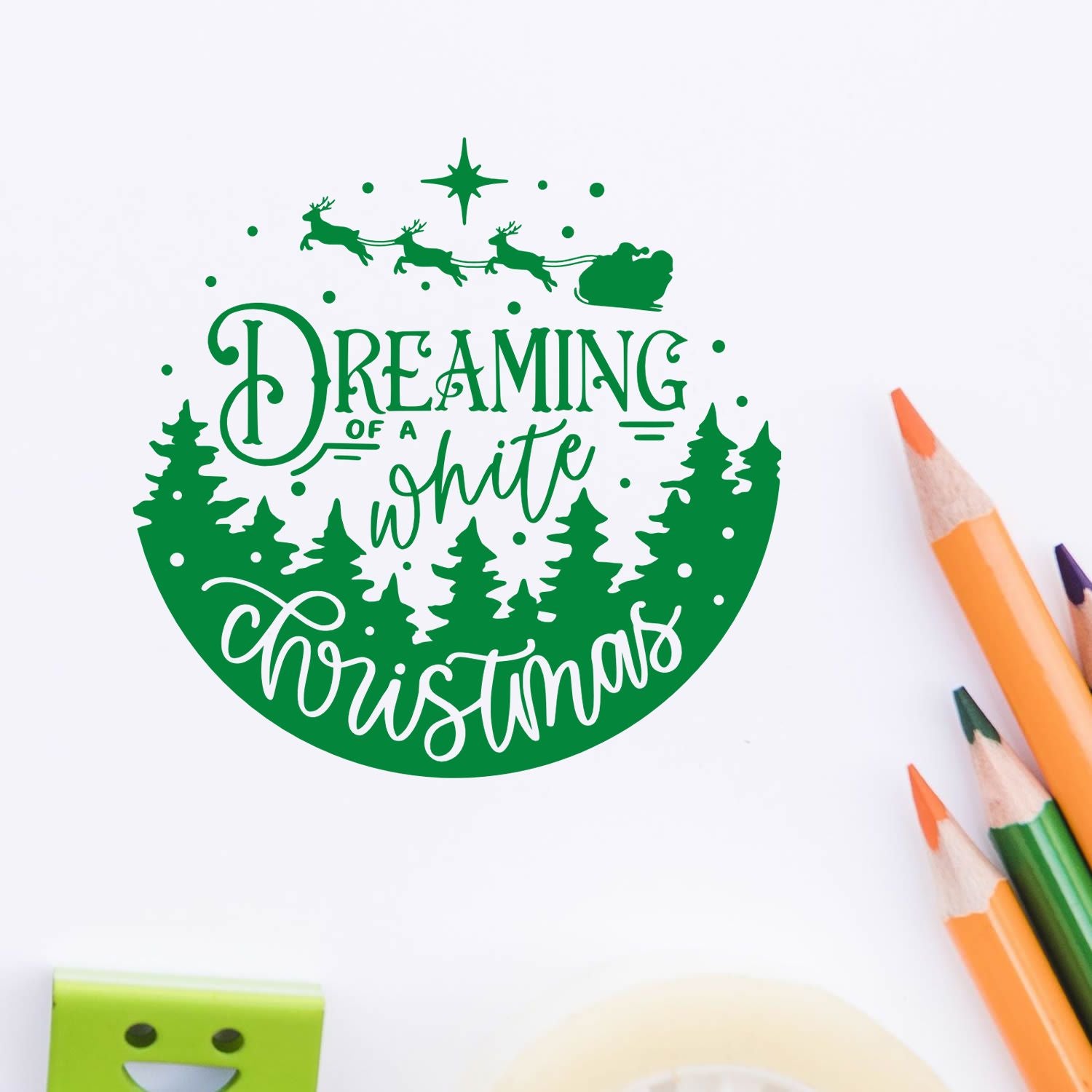 Christmas rubber stamp design reading Dreaming of a White Christmas with Santa sleigh, reindeer, and snowy pine trees.