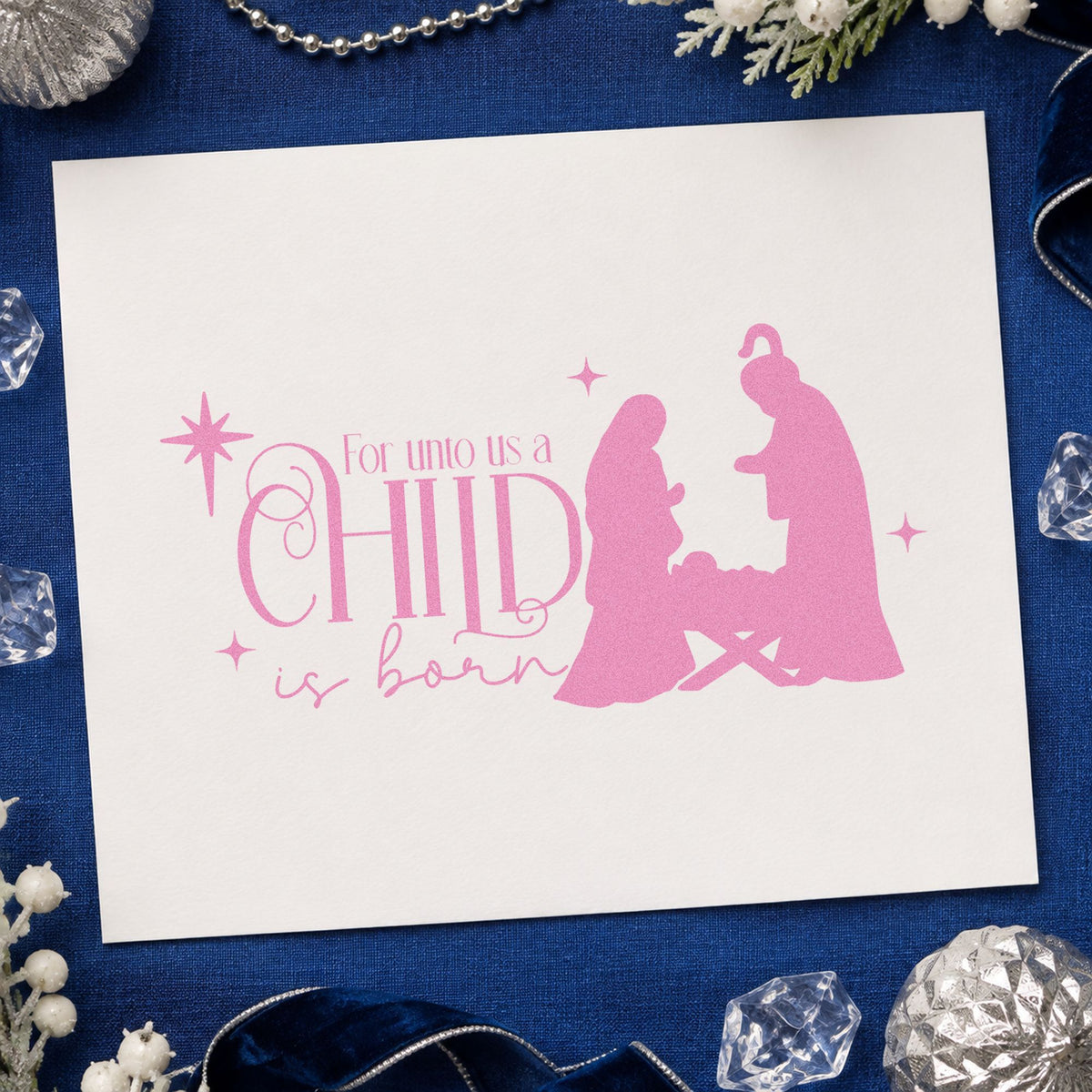 Unto Us Child Is Born craft stamp in purple ink on cardstock, an easy option for dedication album page.