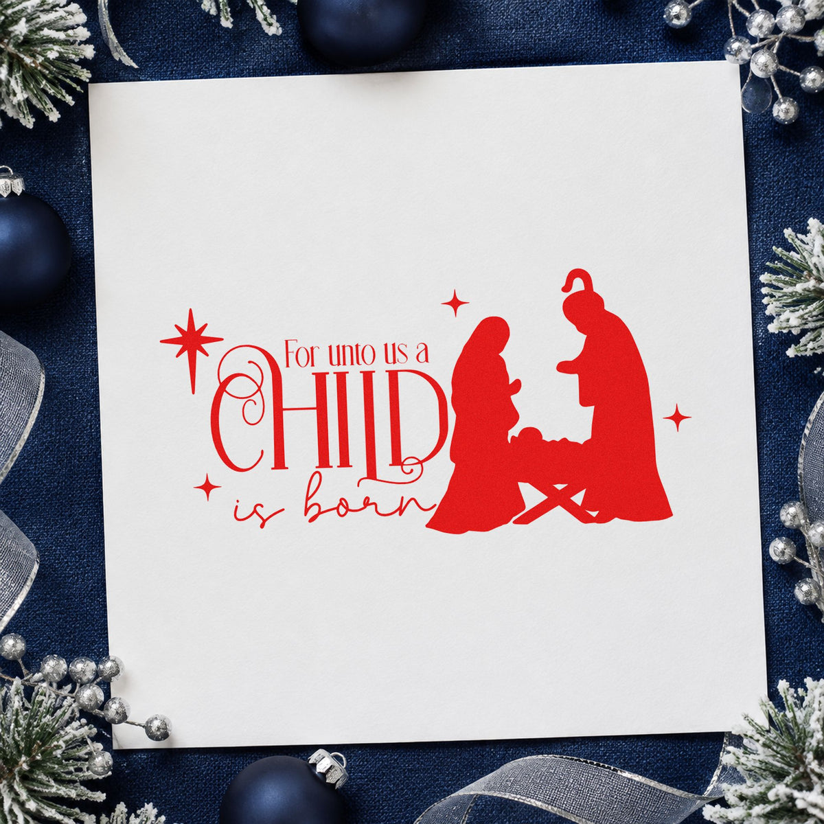 Unto Us Child Is Born craft stamp in red ink on cardstock, an easy option for swaddle cloth ink.