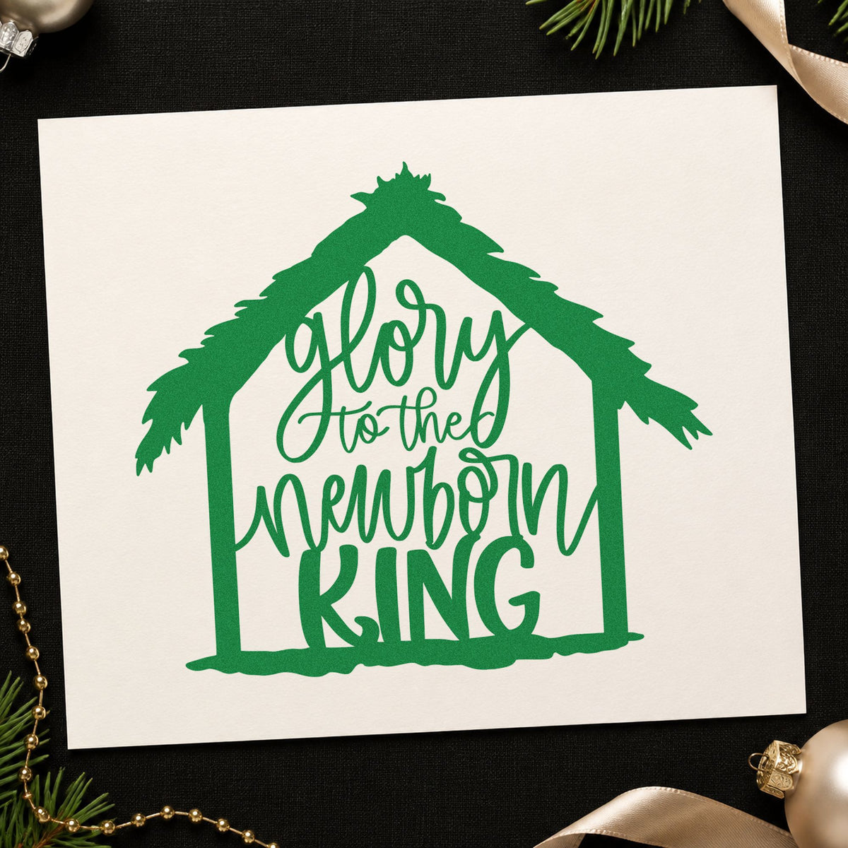 Glory To Newborn King craft stamp imprint in green ink on a handmade project, one idea being costume bag tags.