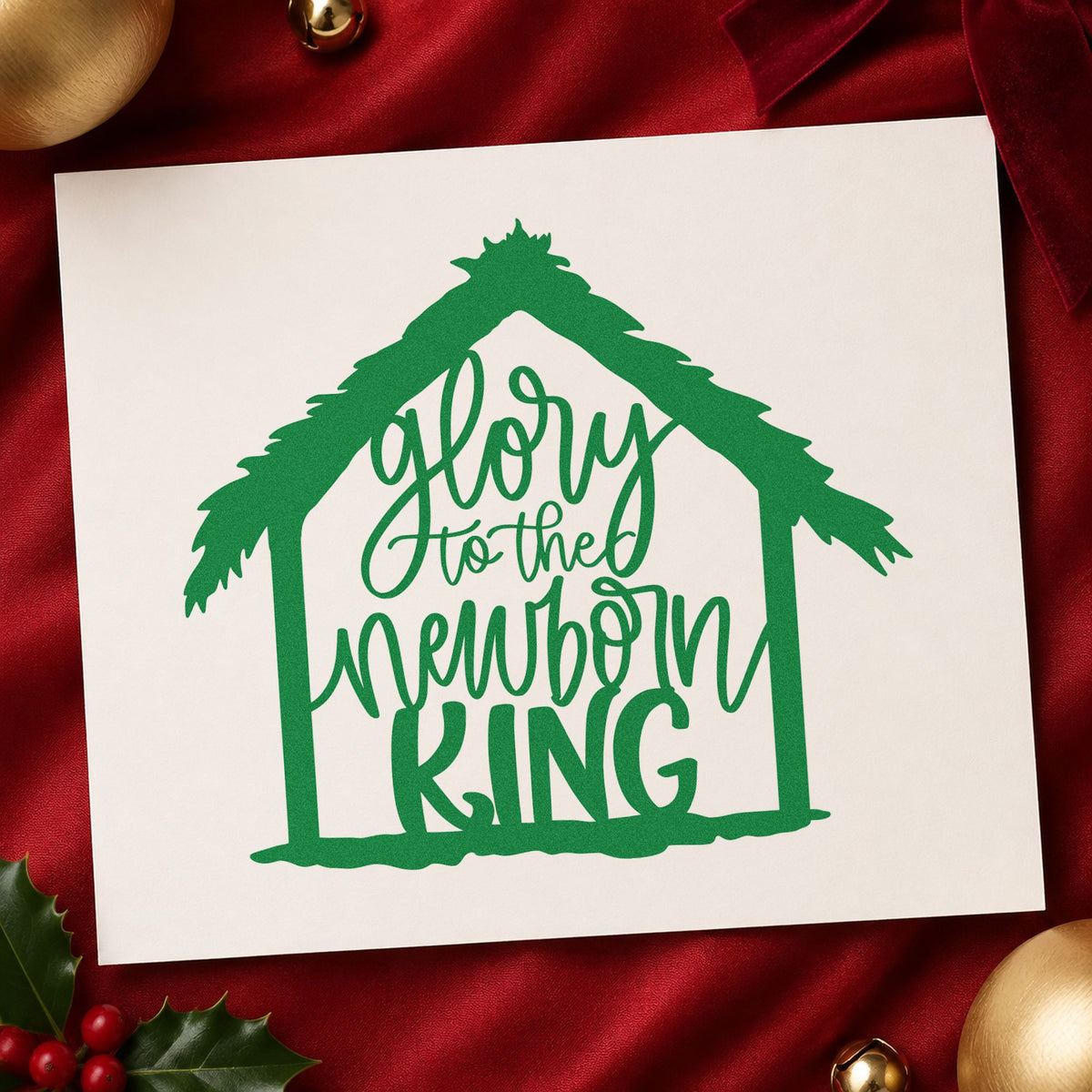 Glory To Newborn King craft stamp imprint in green ink on a handmade project, one idea being cast rehearsal passes.