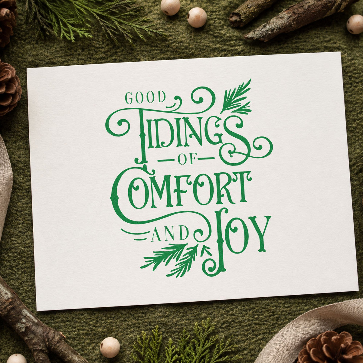 Good Tidings Comfort Joy craft stamp imprint in green ink on a handmade project, one idea being staff luncheon menus.