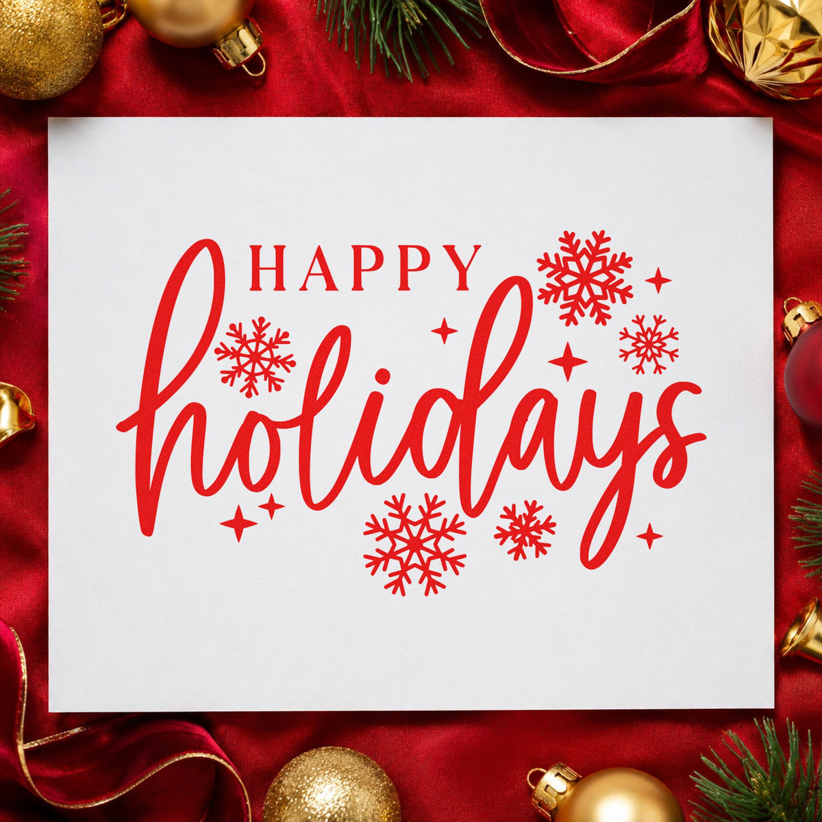 Happy Holidays Snowflakes craft stamp in red ink on cardstock, an easy option for staff apron printing.