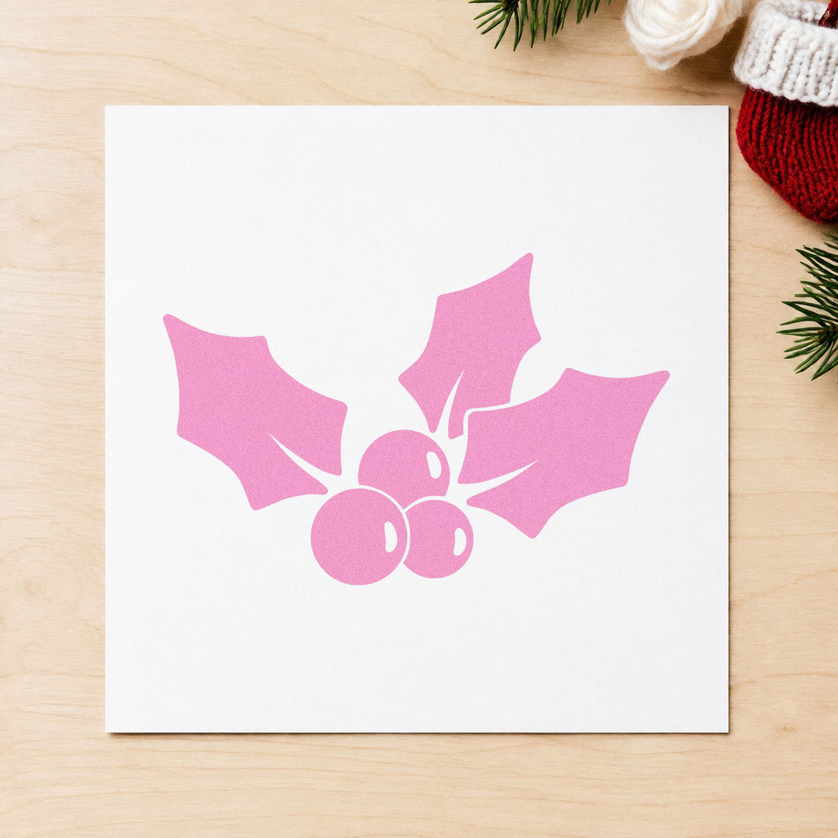 Three Leaf Holly Sprig craft stamp in purple ink on cardstock, an easy option for border pattern paper.