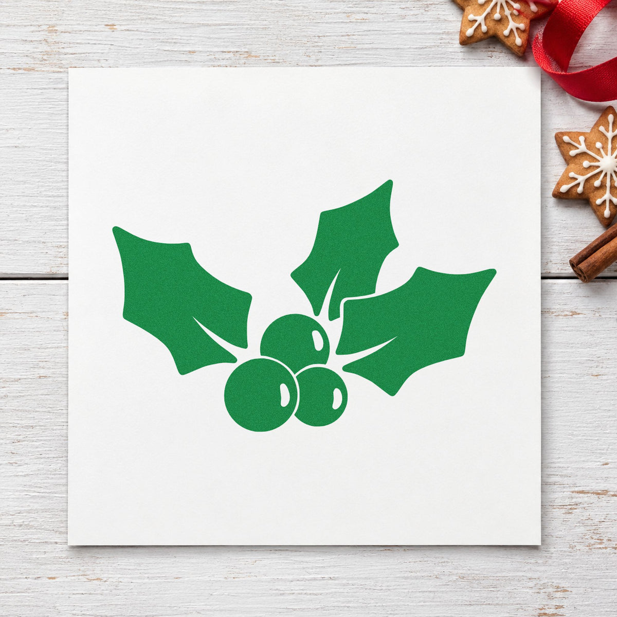 Three Leaf Holly Sprig craft stamp imprint in green ink on a handmade project, one idea being blank gift tags.