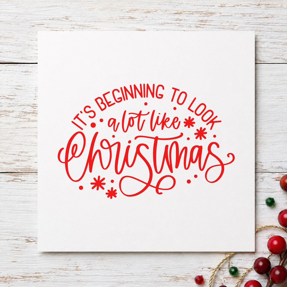 Beginning To Look Like Christmas craft stamp in red ink on cardstock, an easy option for storage bag printing.