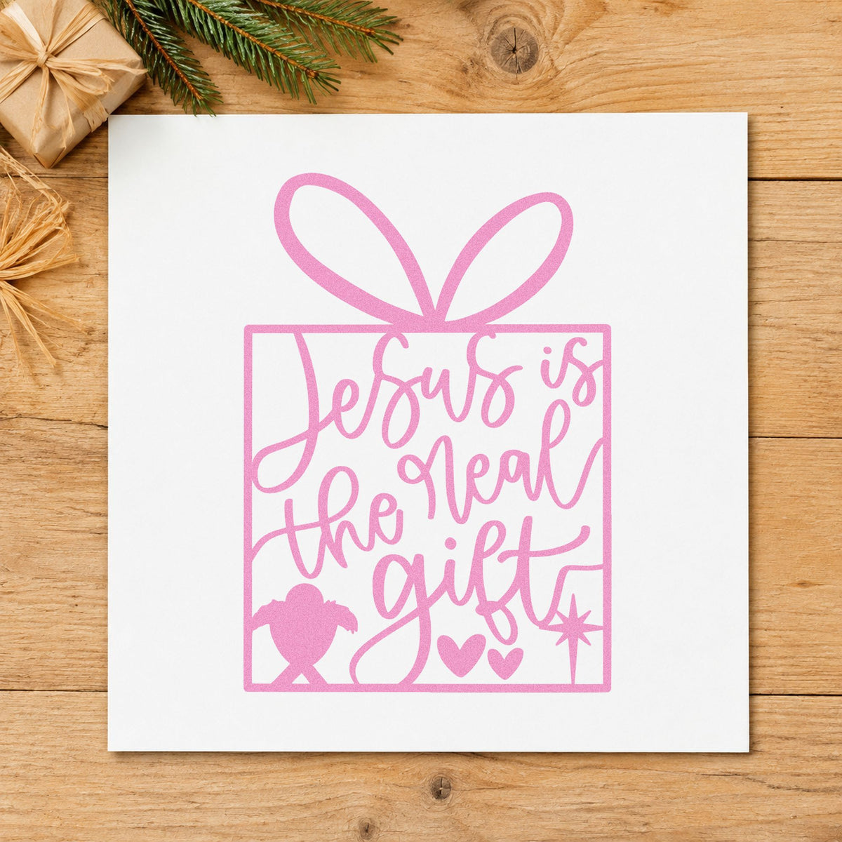Jesus Is The Real Gift craft stamp in purple ink on cardstock, an easy option for giving album page.