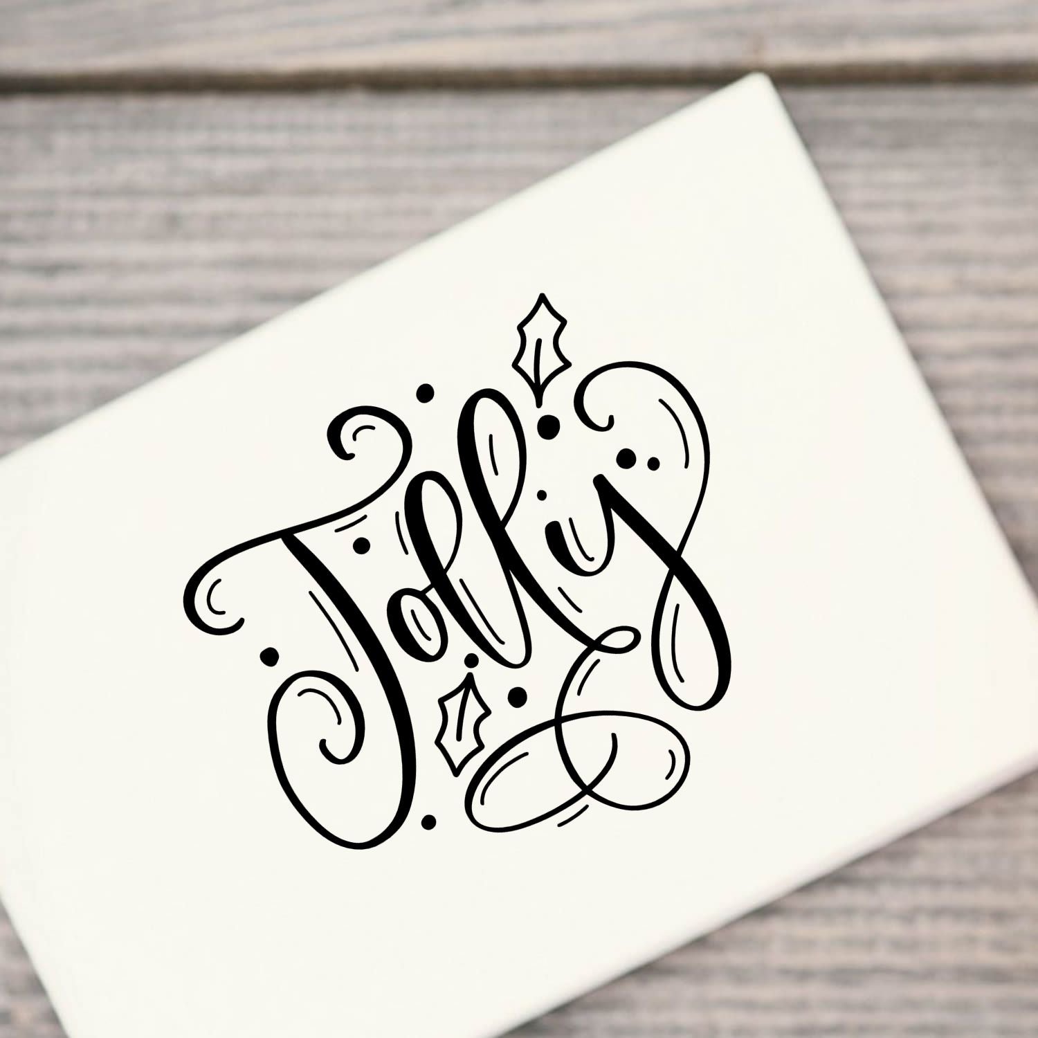 Jolly Christmas rubber stamp with decorative script and holly design for holiday card making