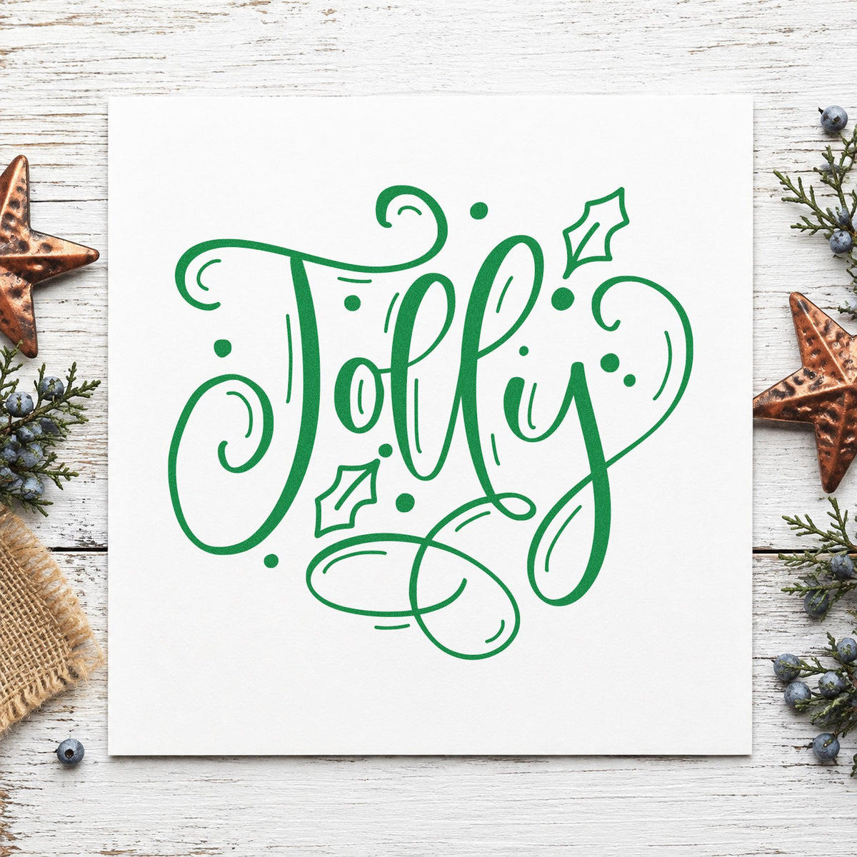 Jolly With Holly craft stamp imprint in green ink on a handmade project, one idea being mood word gift tags.