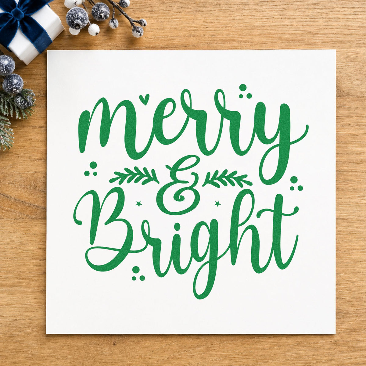 Merry And Bright Leaves craft stamp imprint in green ink on a handmade project, one idea being multi use gift tags.