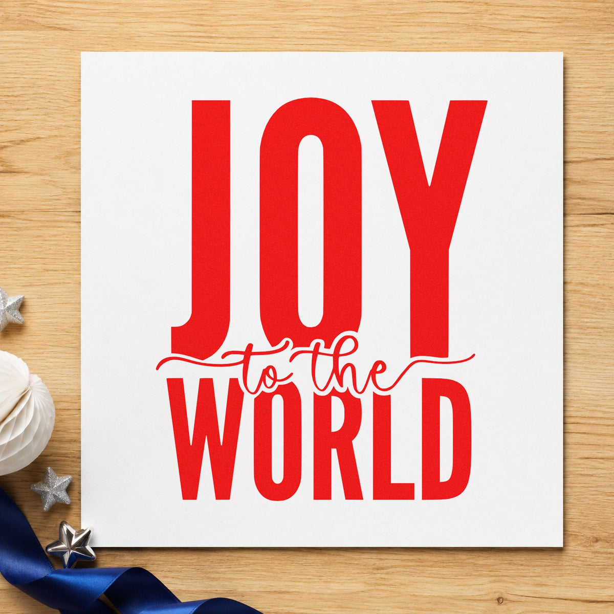 Joy To The World Bold craft stamp in red ink on cardstock, an easy option for canvas tote printing.
