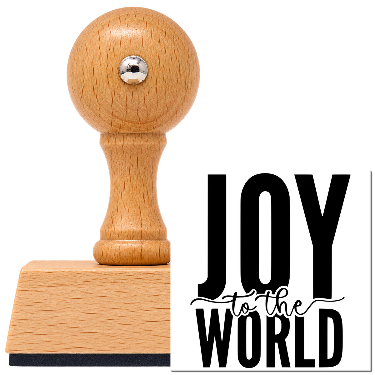 Joy To The World Bold Vintage Pro rubber stamp in European beech wood with a round knob handle, shown beside its black imprint.