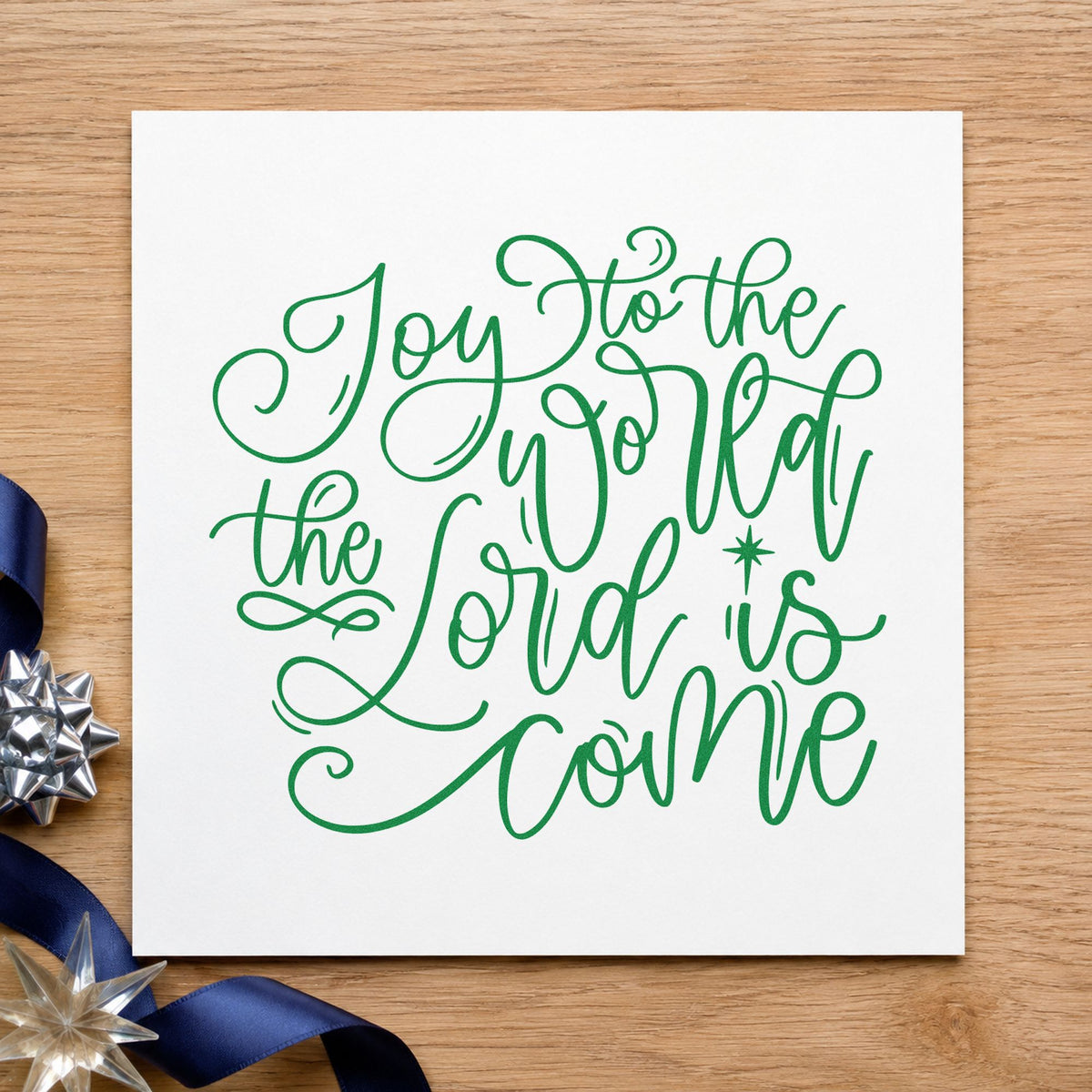 Joy World Lord Is Come craft stamp imprinted in green ink on paper, a design suited to framed long hallway.