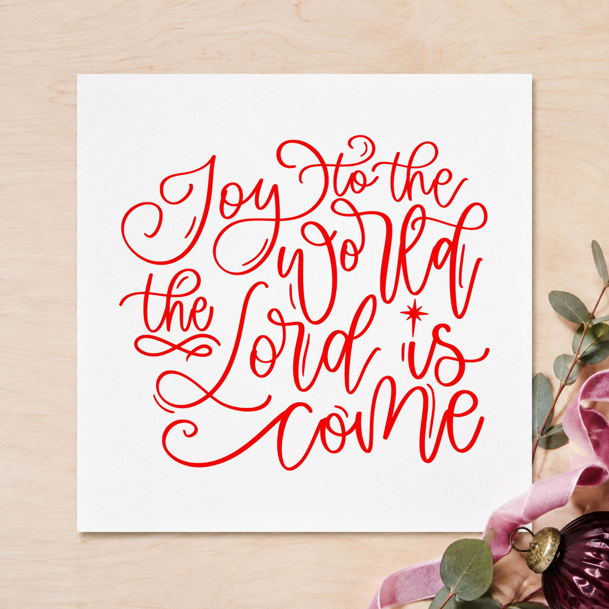 Joy World Lord Is Come rubber stamp shown in red ink, stamped for projects such as advent packet seals.
