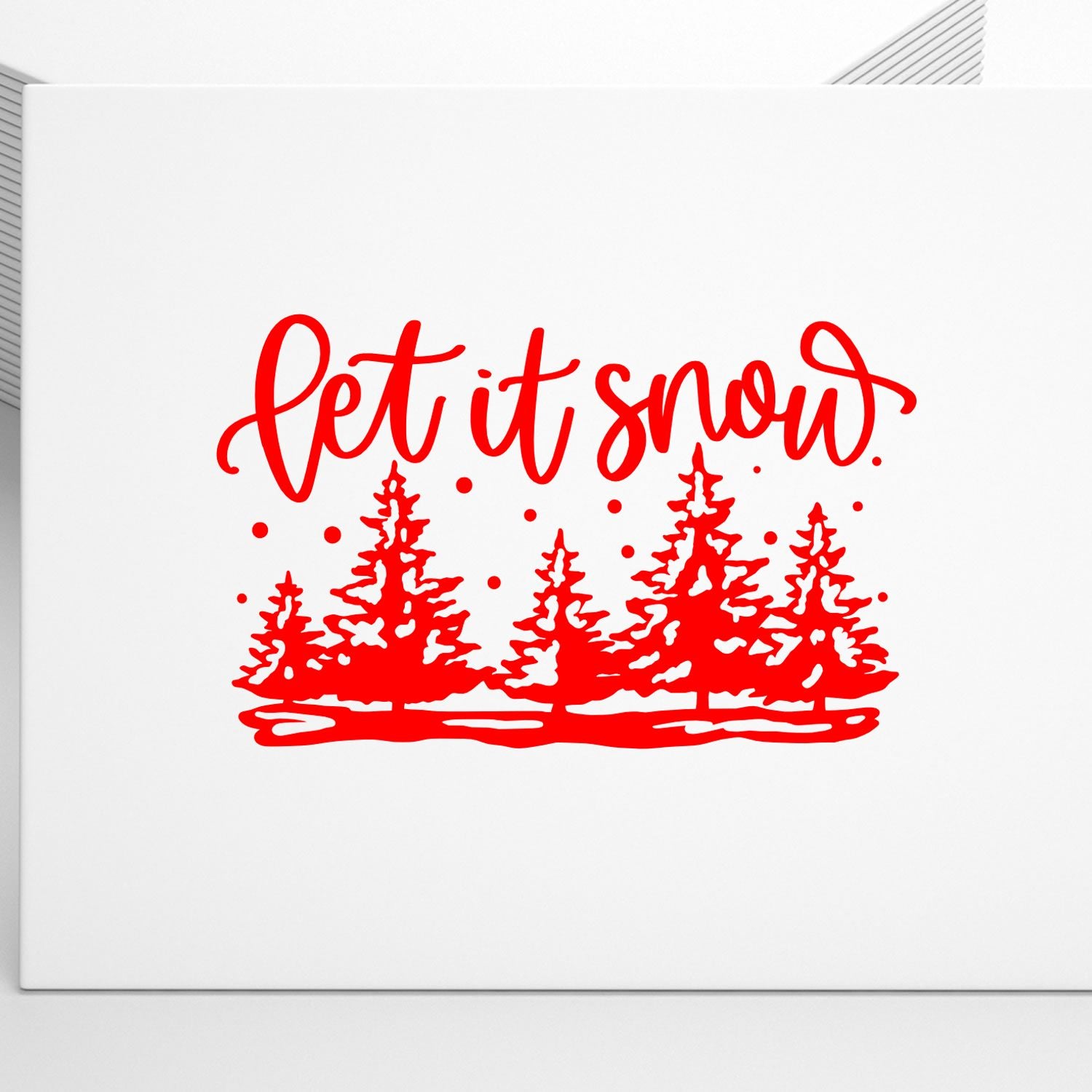 Let It Snow winter rubber stamp design with pine trees and falling snow for holiday cards.