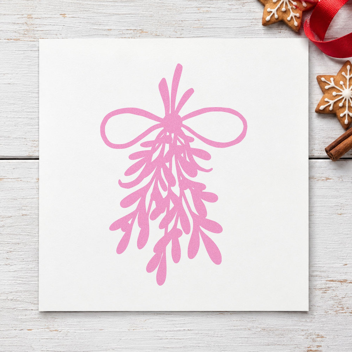 Mistletoe Bundle With Bow craft stamp in purple ink on cardstock, an easy option for repeat wrap pattern.