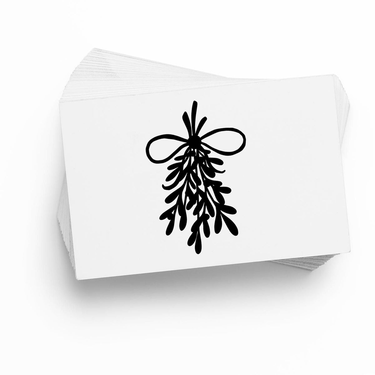 Mistletoe Bundle With Bow Leaf Accents Stamp - Premium Vintage Pro Wooden imprint stamped in black ink. A hanging leafy mistletoe bundle is tied at the top with a large looped bow.