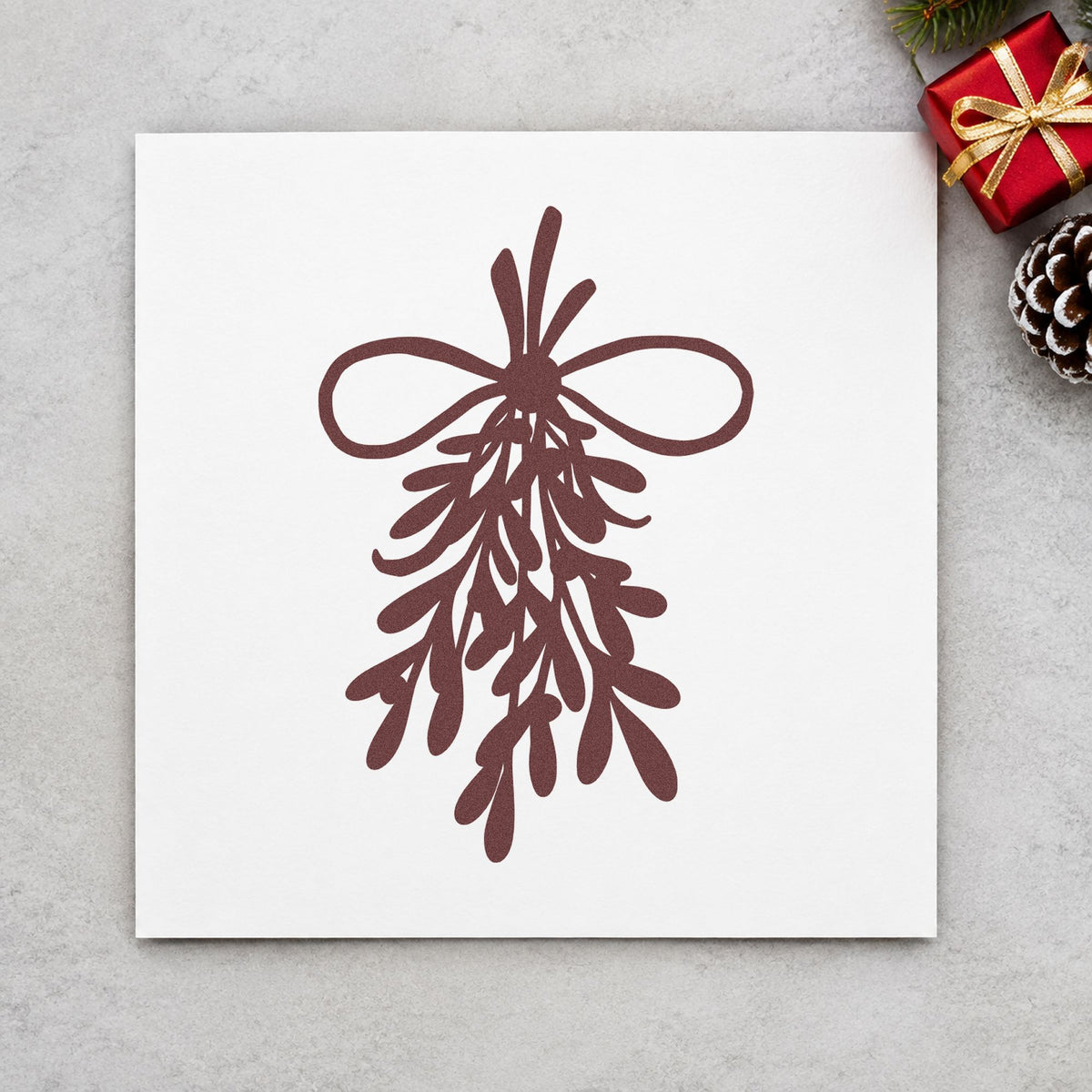 Mistletoe Bundle With Bow rubber stamp printed in brown ink, ready for corner page accent and similar paper crafts.