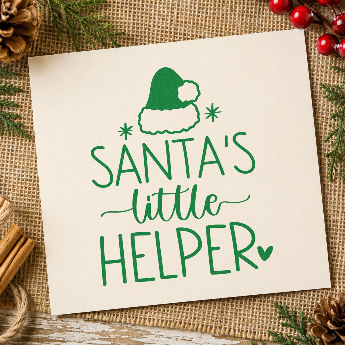 Santa's Little Helper Hat craft stamp imprint in green ink on a handmade project, one idea being kid made gift tags.