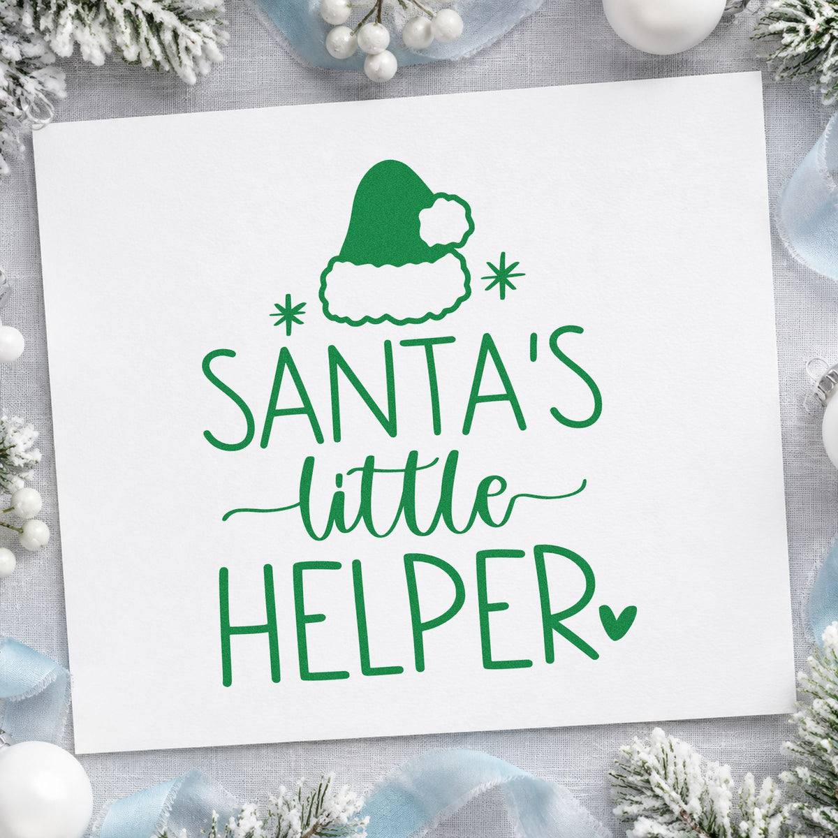 Santa's Little Helper Hat craft stamp imprinted in green ink on paper, a design suited to framed step stool.
