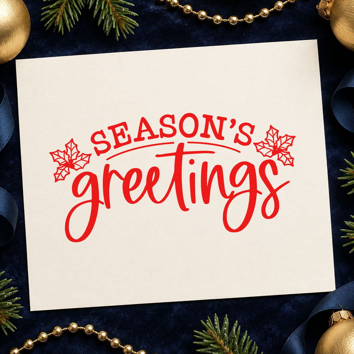 Season's Greetings Holly craft stamp in red ink on cardstock, an easy option for shop apron printing.