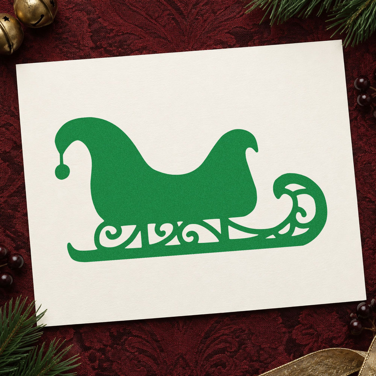 Decorative Santa Sleigh craft stamp imprint in green ink on a handmade project, one idea being silhouette gift tags.