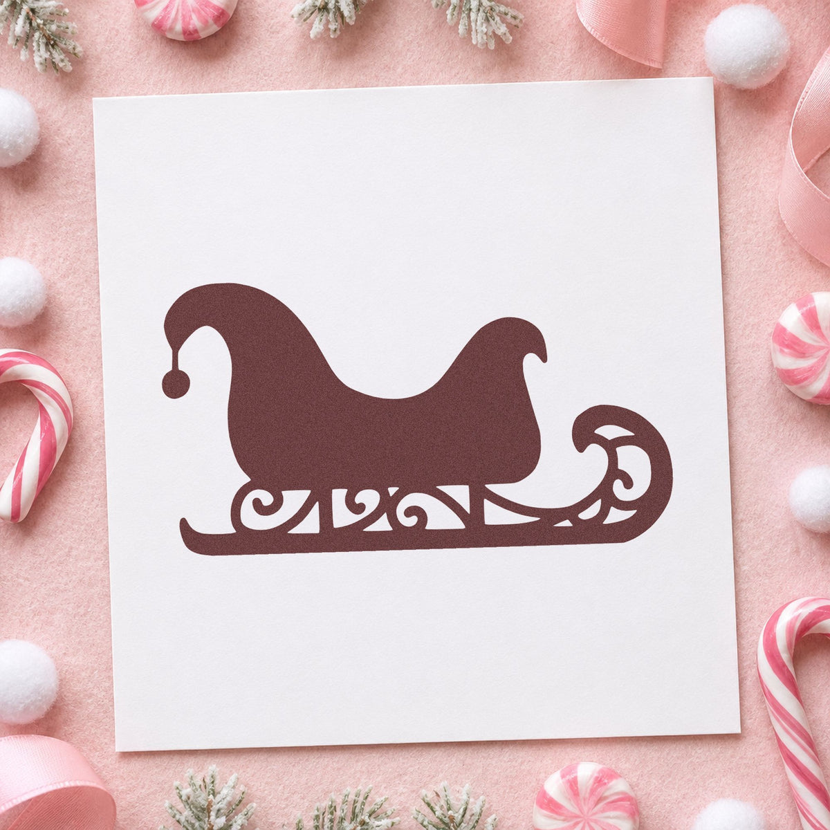 Decorative Santa Sleigh rubber stamp printed in brown ink, ready for journal margin mark and similar paper crafts.