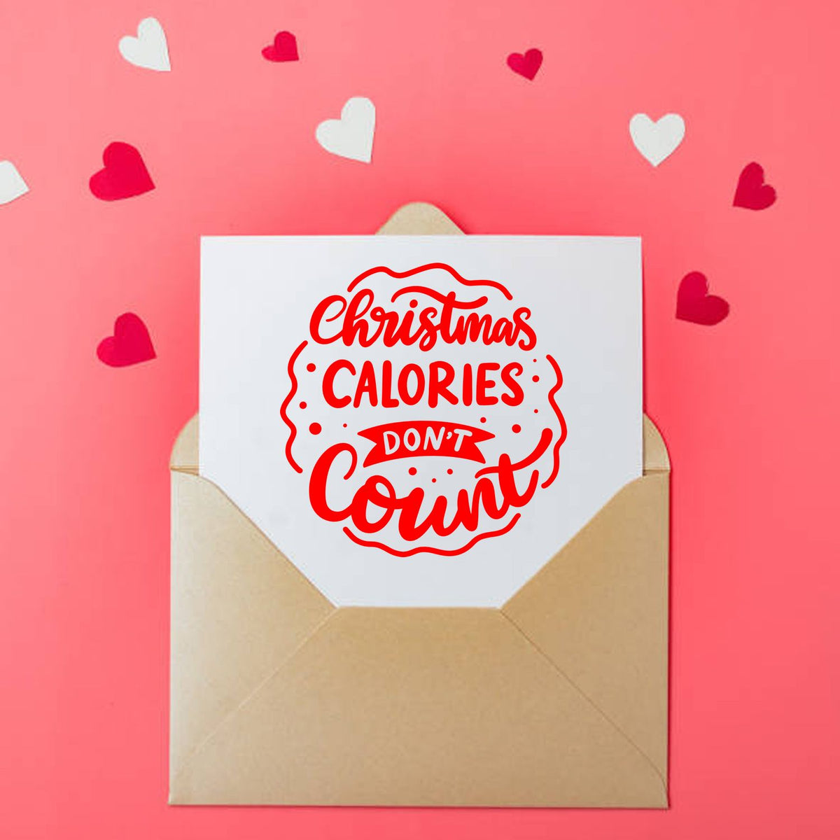 Christmas Calories Don't Count rubber stamp shown in red ink, stamped for projects such as feast album page.