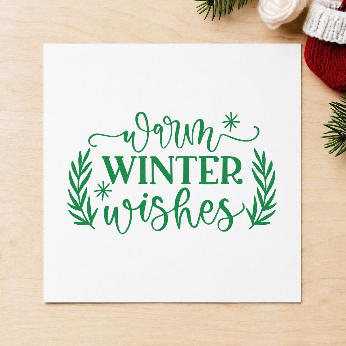 Warm Winter Wishes craft stamp imprint in green ink on a handmade project, one idea being hospital visit cards.