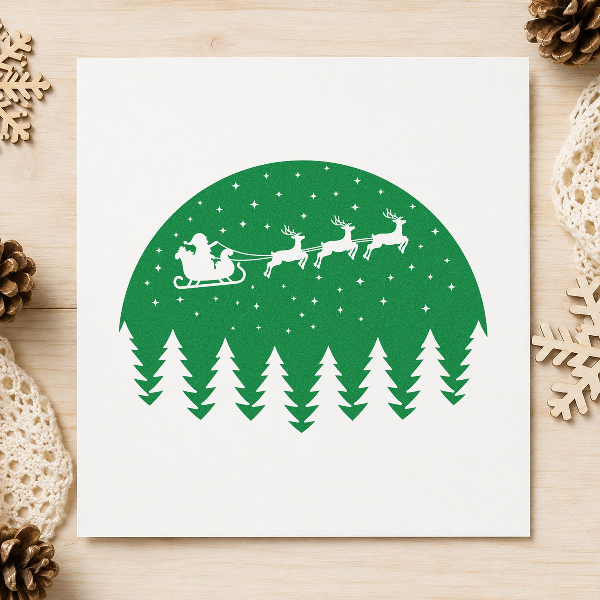 Santa Sleigh Snowy Forest Circle craft stamp imprint in green ink on a handmade project, one idea being dinner place cards.