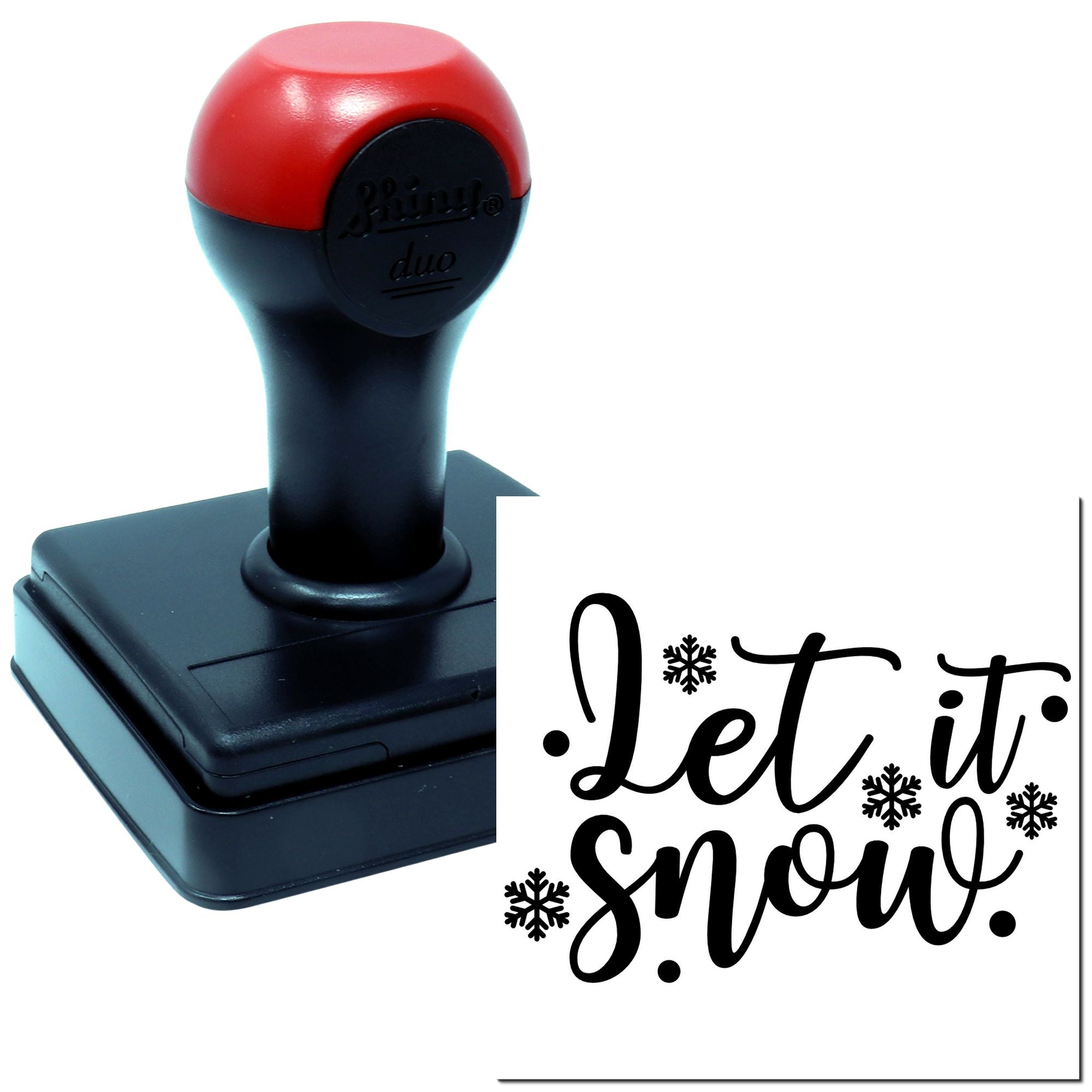 Self-inking rubber stamp with Let it snow winter design and snowflakes for holiday cards, crafts, and seasonal projects.