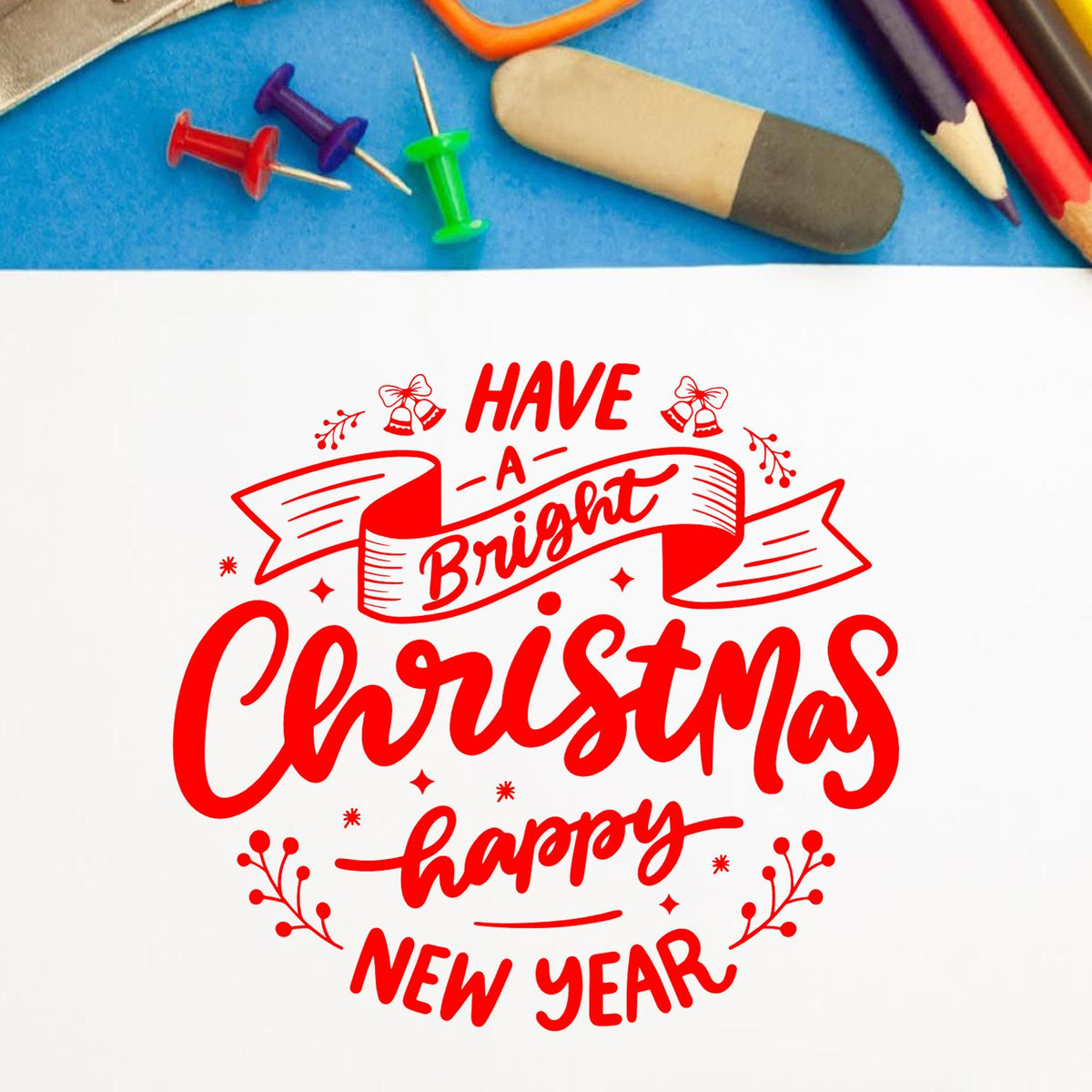 Bright Christmas Happy New Year rubber stamp shown in red ink, stamped for projects such as year review album.