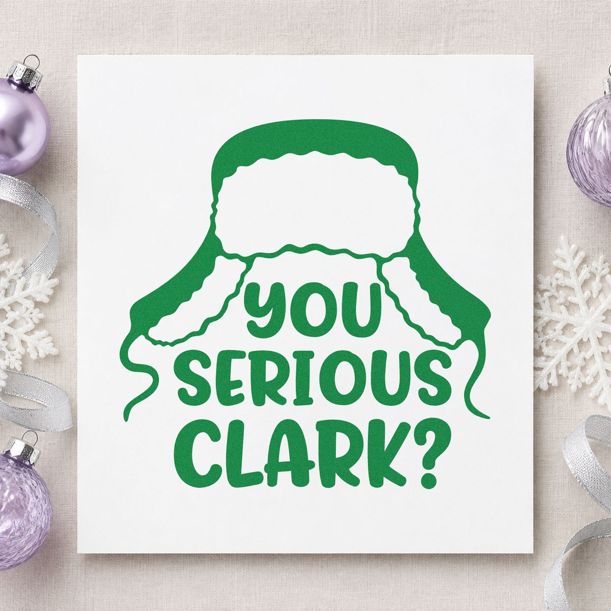 You Serious Clark Winter Hat craft stamp imprint in green ink on a handmade project, one idea being gag wrap gift tags.