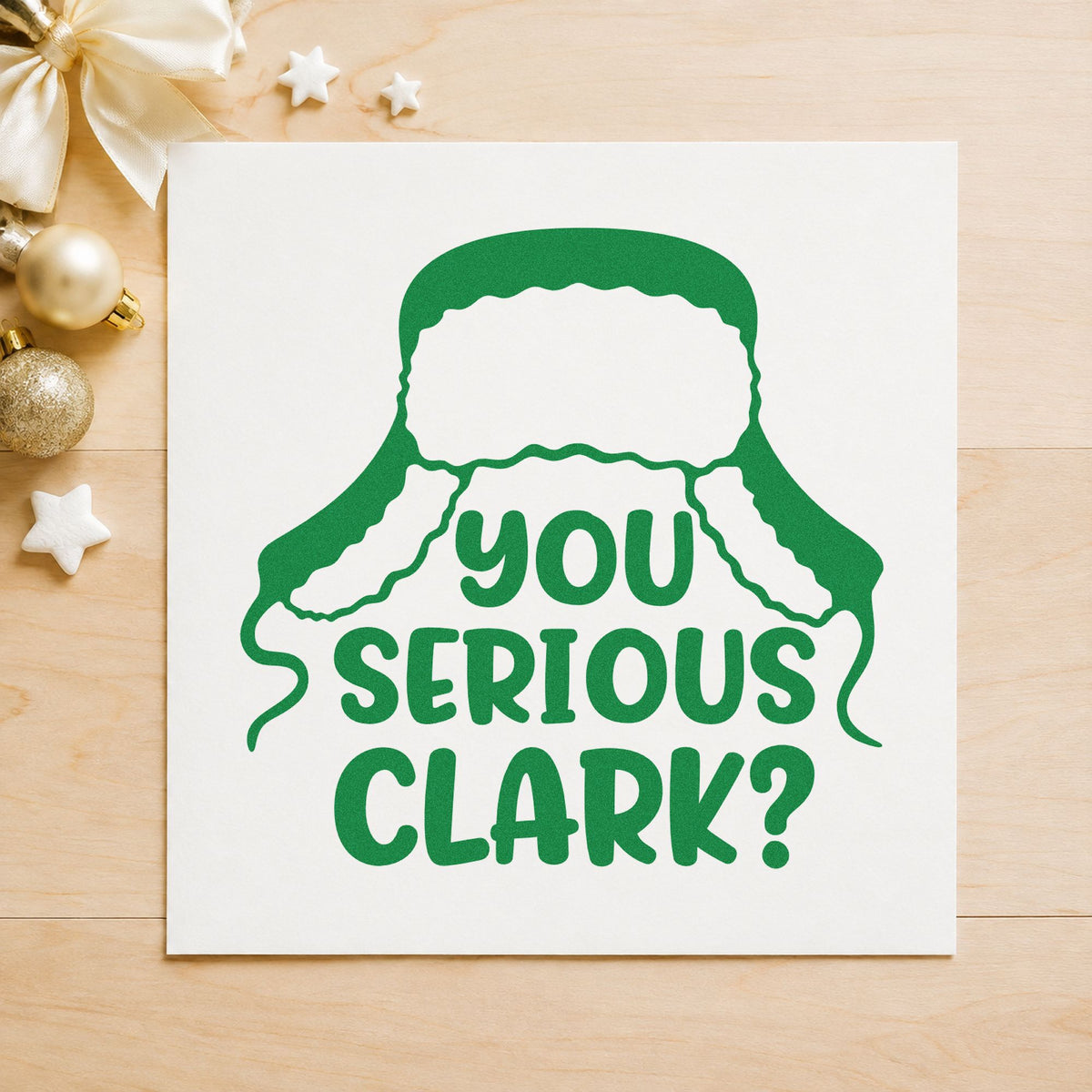 You Serious Clark Winter Hat craft stamp imprinted in green ink on paper, a design suited to framed basement wall.