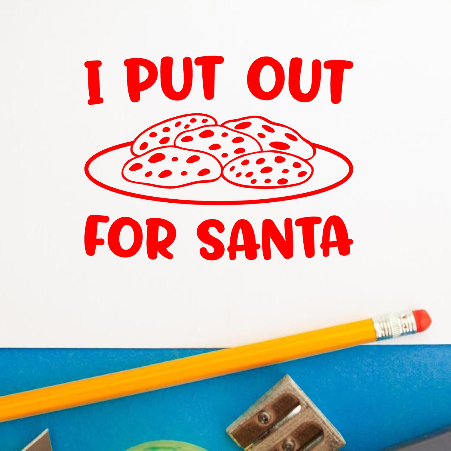 Humorous Christmas rubber stamp design with text I Put Out for Santa and cookies on a plate.