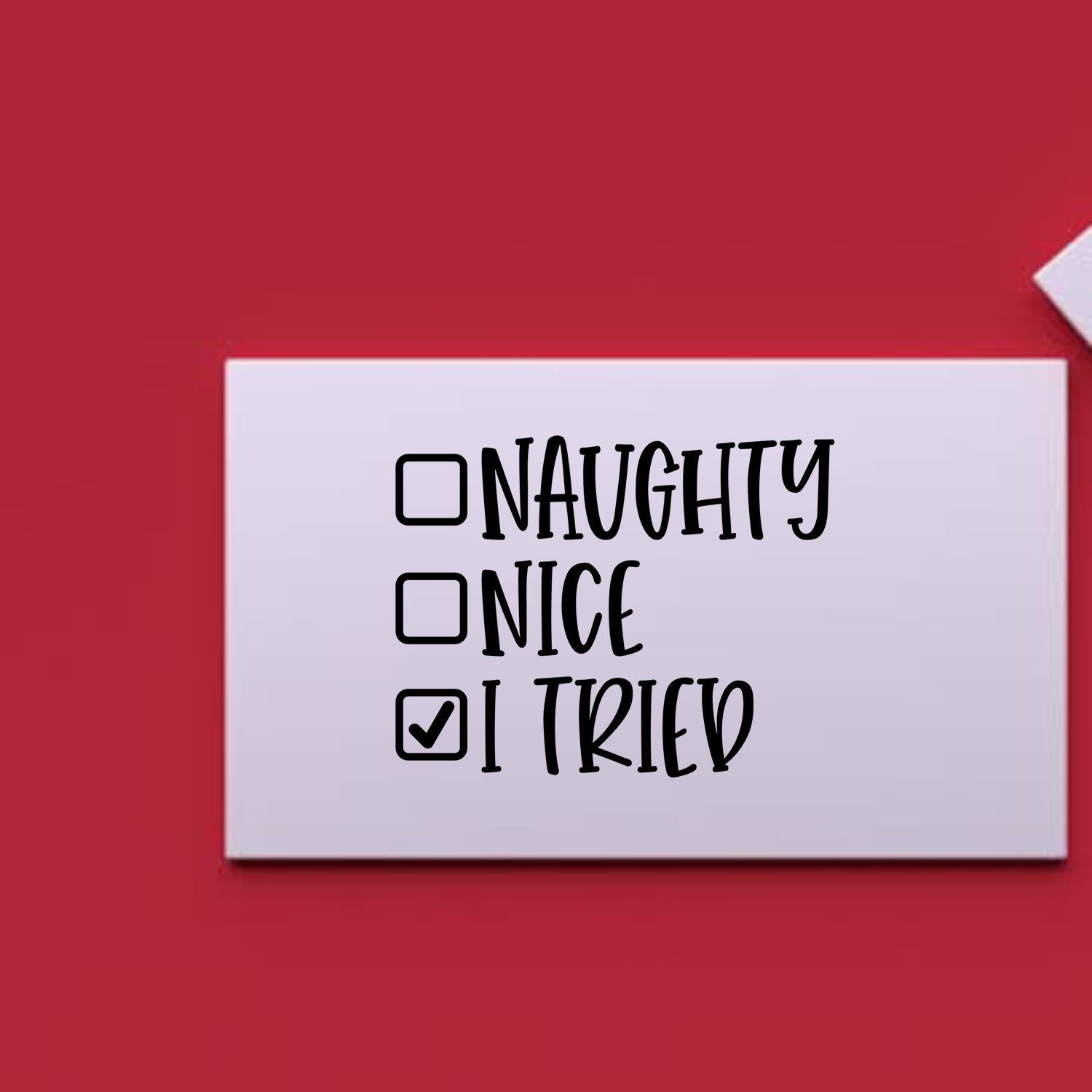 Funny rubber stamp design with checkbox list: Naughty, Nice, and checked I Tried for holiday crafting.