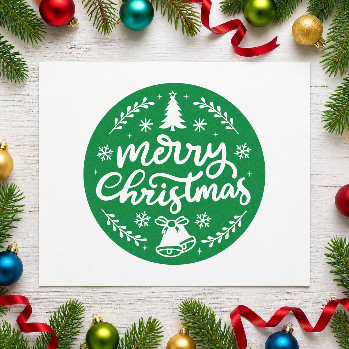 Merry Christmas Round Botanical Badge craft stamp imprint in green ink on a handmade project, one idea being sticker seal tags.