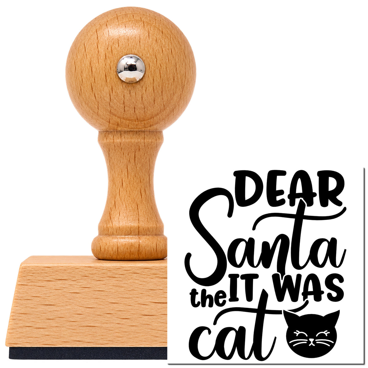 Dear Santa It Was Cat Vintage Pro rubber stamp in European beech wood with a round knob handle, shown beside its black imprint.