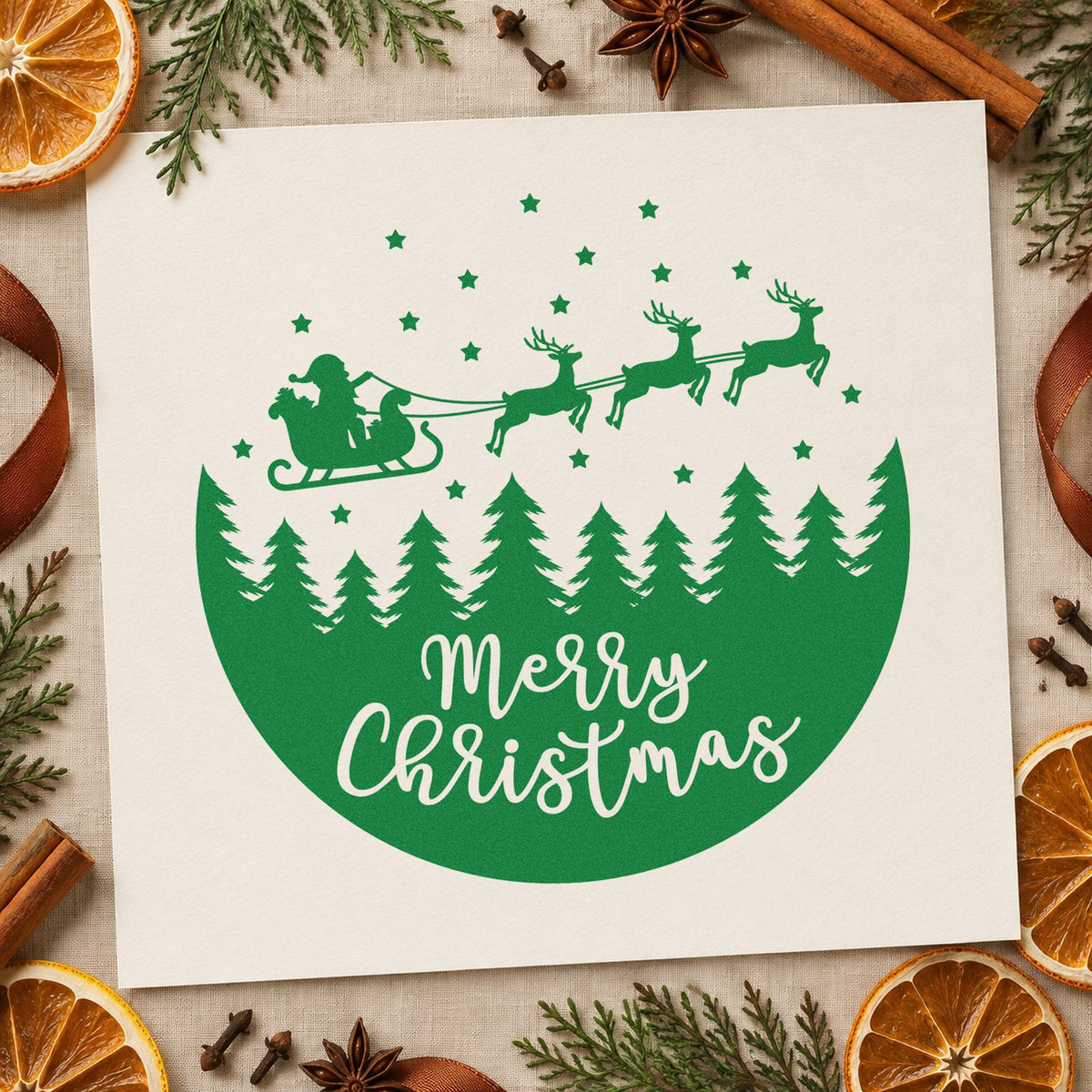 Merry Christmas Sleigh Forest Circle craft stamp imprint in green ink on a handmade project, one idea being table coaster rounds.