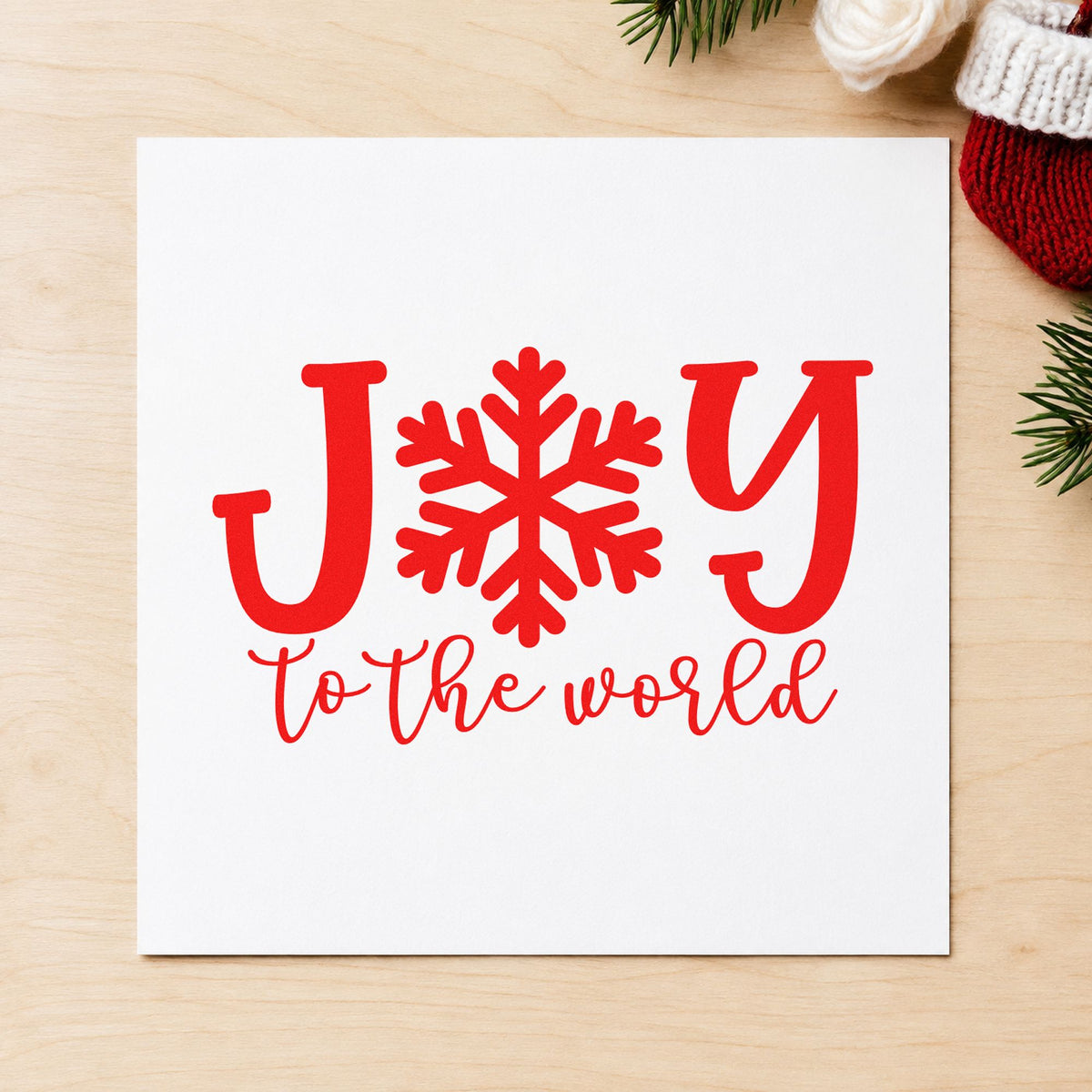 Joy World Snowflake Letter rubber stamp shown in red ink, stamped for projects such as glitter jar labels.