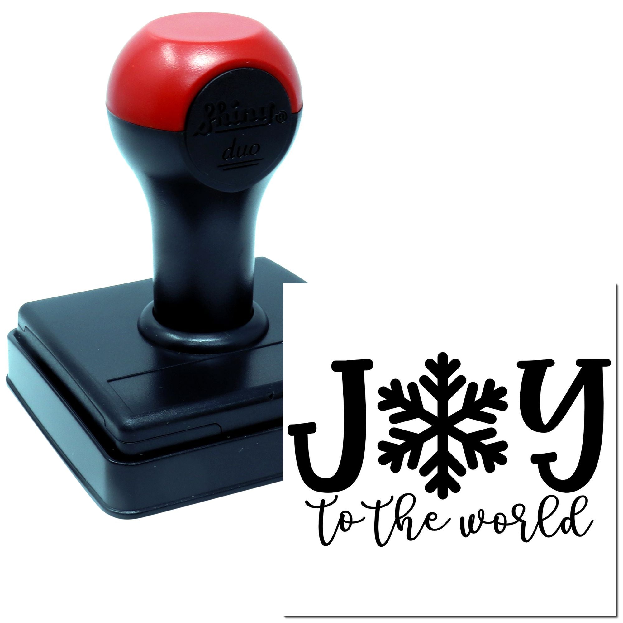 Self-inking rubber stamp with Joy to the world holiday design and snowflake detail, ideal for festive card making.