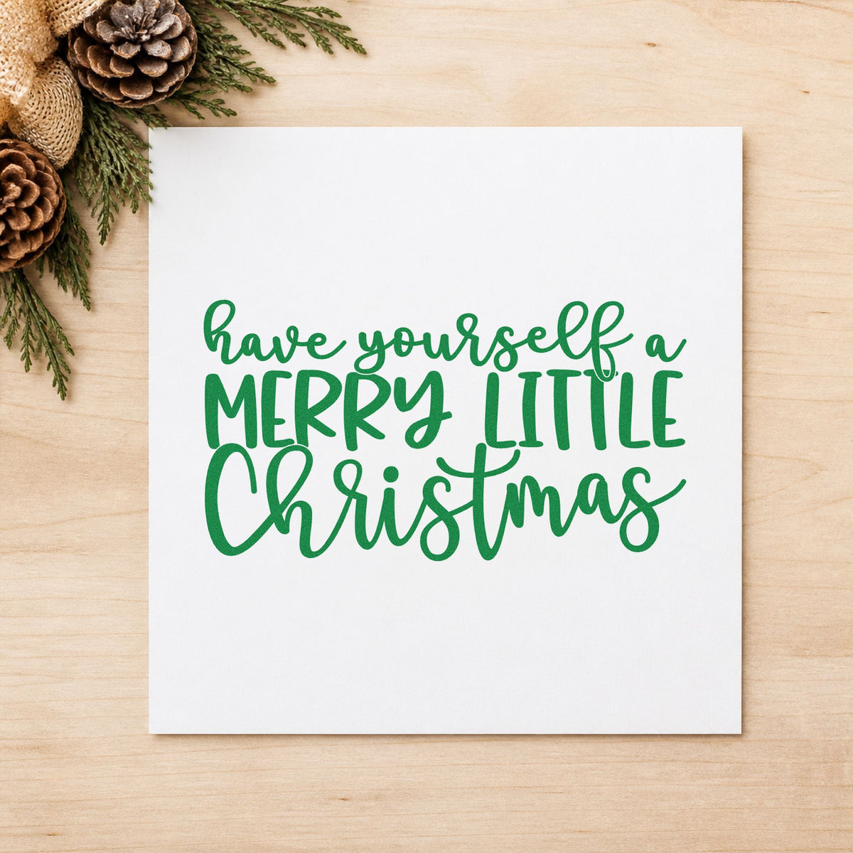 Have Yourself Merry Little Christmas craft stamp imprint in green ink on a handmade project, one idea being record gift tags.
