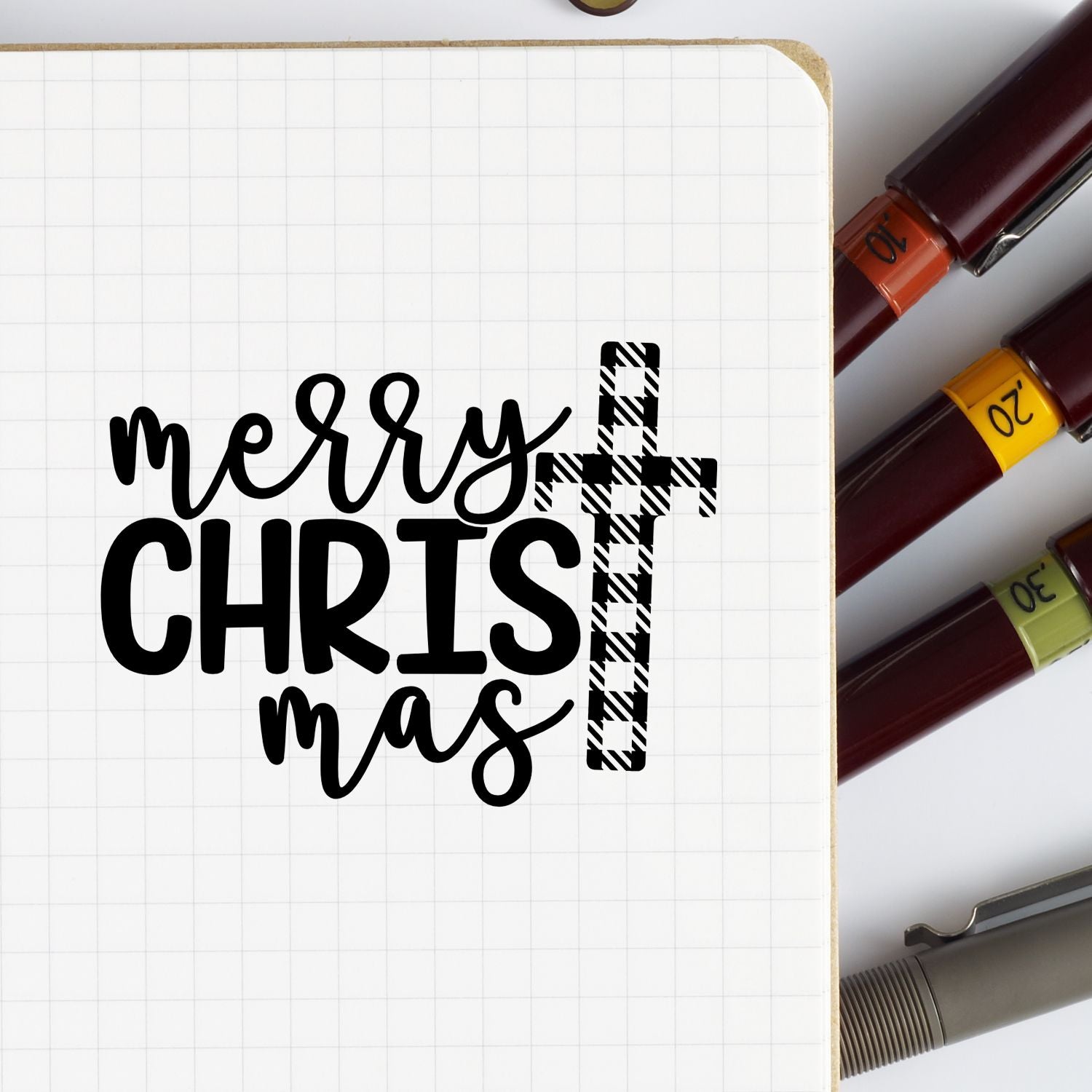 Merry Chris-mas rubber stamp design with plaid cross for Christmas card making and faith-based holiday crafts.