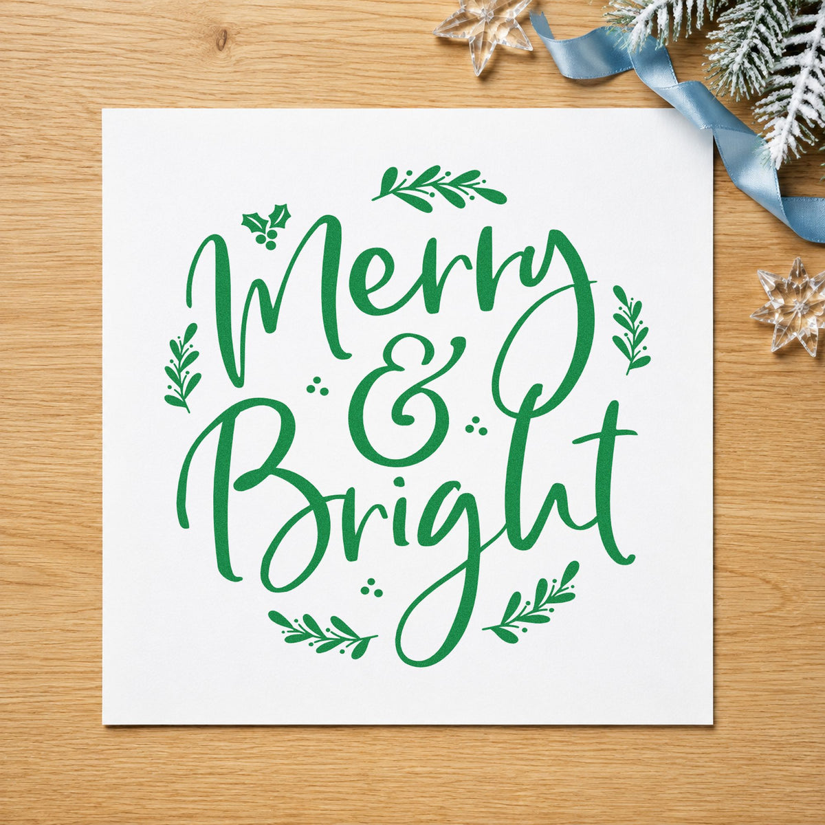 Merry And Bright Botanical craft stamp imprinted in green ink on paper, a design suited to framed sample board.