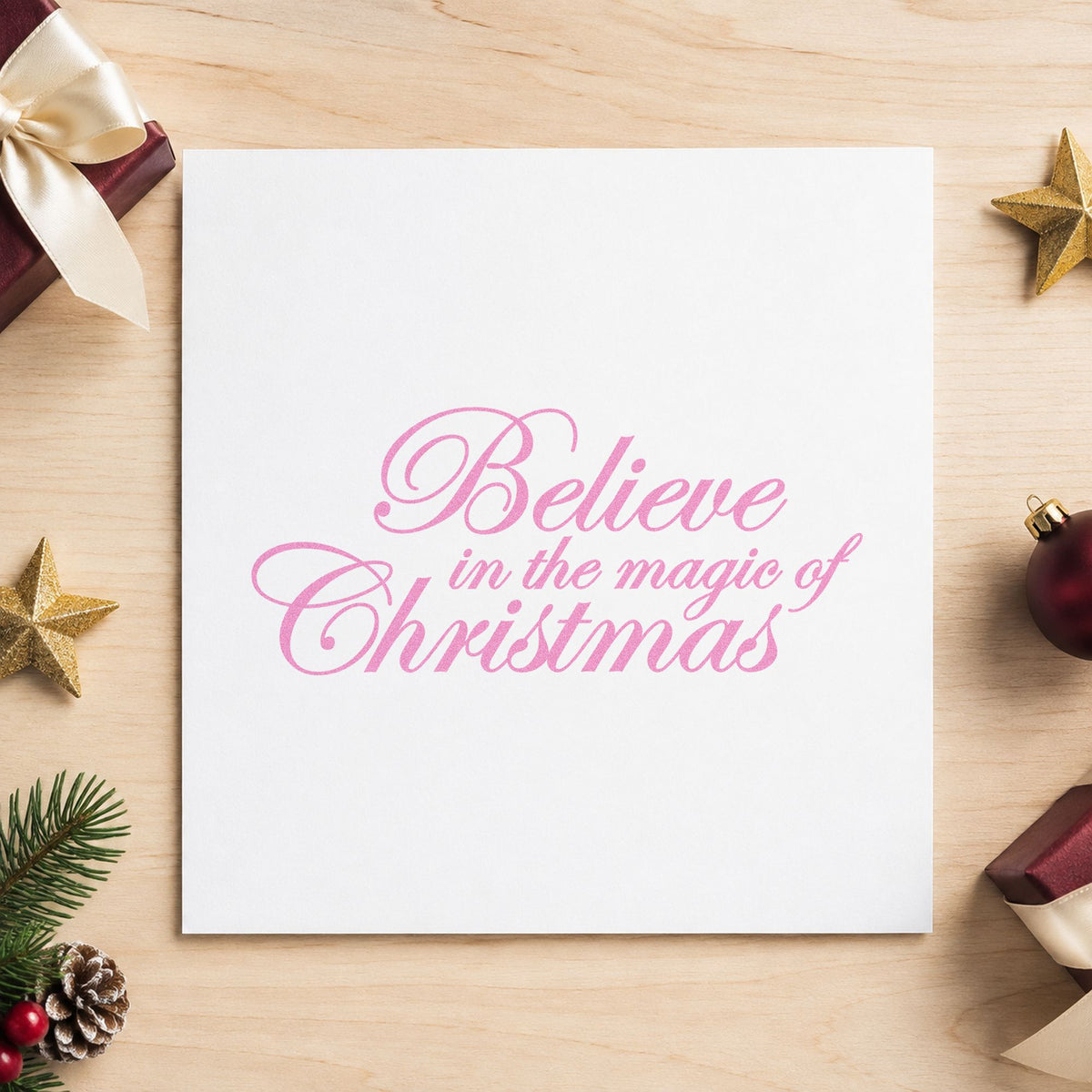 Believe Magic Of Christmas Script craft stamp in purple ink on cardstock, an easy option for wedding album plate.